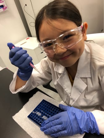 Mei transferring her sample to Biomeme Go-Strips.
